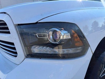 2014 RAM 1500 4WD Quad Cab 6.4 Ft Box Sport